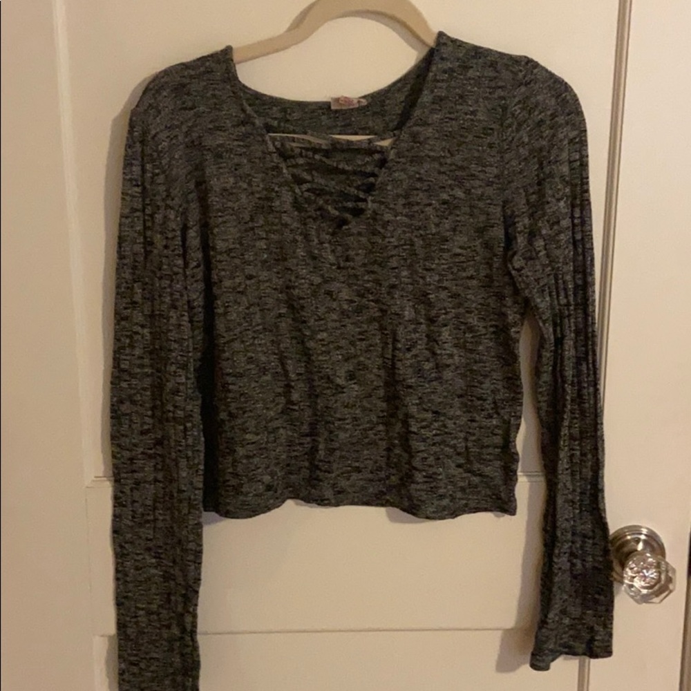 grey long sleeve shirt with crosses on front